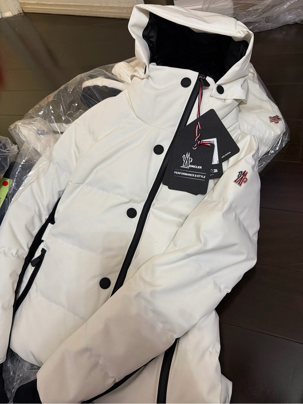 Moncler Off-White Puffer Jacket with Black Accents